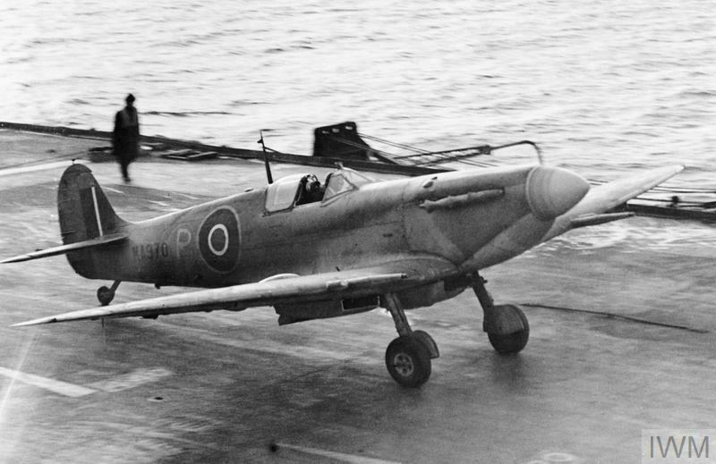 A Supermarine Seafire Mk.IIC taxies to park after landing on board HMS Illustrious