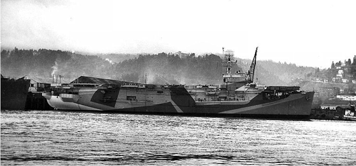 HMS Trouncer (D85) alongside a pier at Portland, Oregon on February 9th 1944, soon after completion
