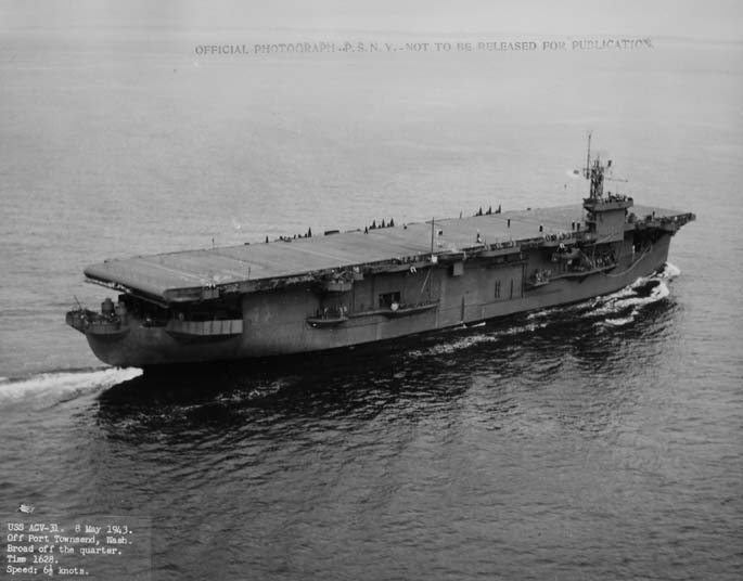 USS Prince William (ACV-31) underway off Port Townsend, Wash., 8 May 1943.